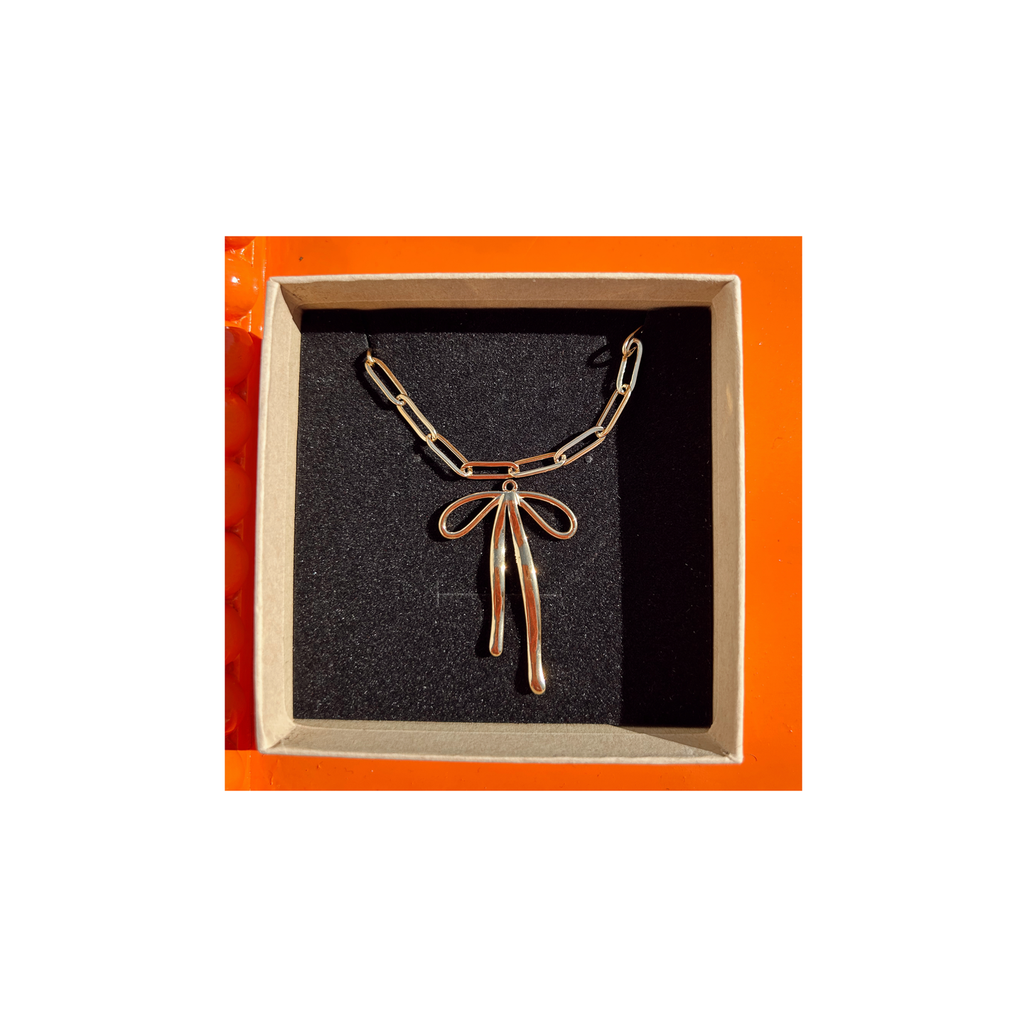 Long gold bow